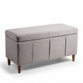 Fabric storage bench with padded lid and wooden legs in light gray 90 x 40 x 45cm